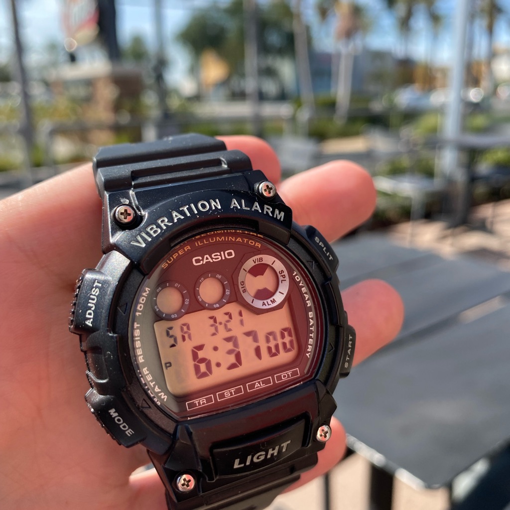 Casio Black Digital Watch With Peach Display Casio Black Digital Watch With Peach Display